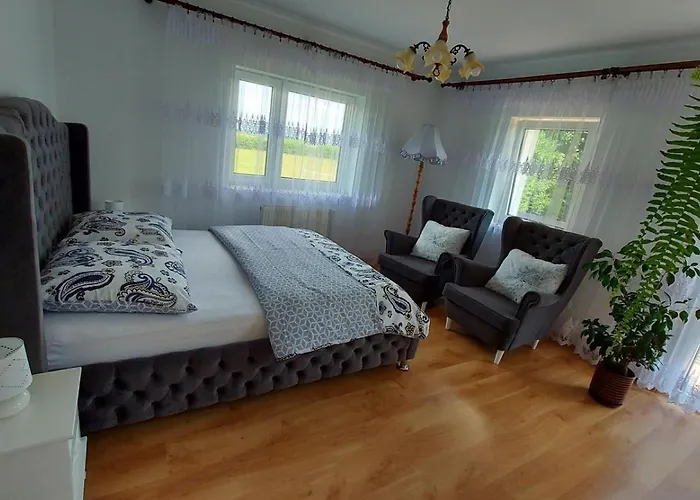 Дом отдыха Mazurskie Zacisze - Sauna, Jacuzzi, Kominek Trygort